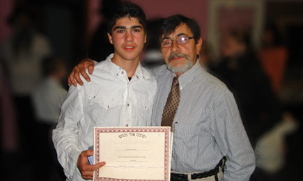 Receiving diploma